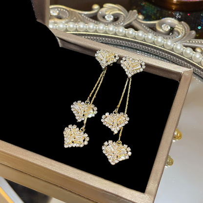 🥳 VÝPRODEJ 2026 💞🔥 Romantické dlouhé náušnice s řetízkem a přívěskem ve tvaru srdce