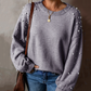 Dámský svetr s kulatým výstřihem a umělými perlami